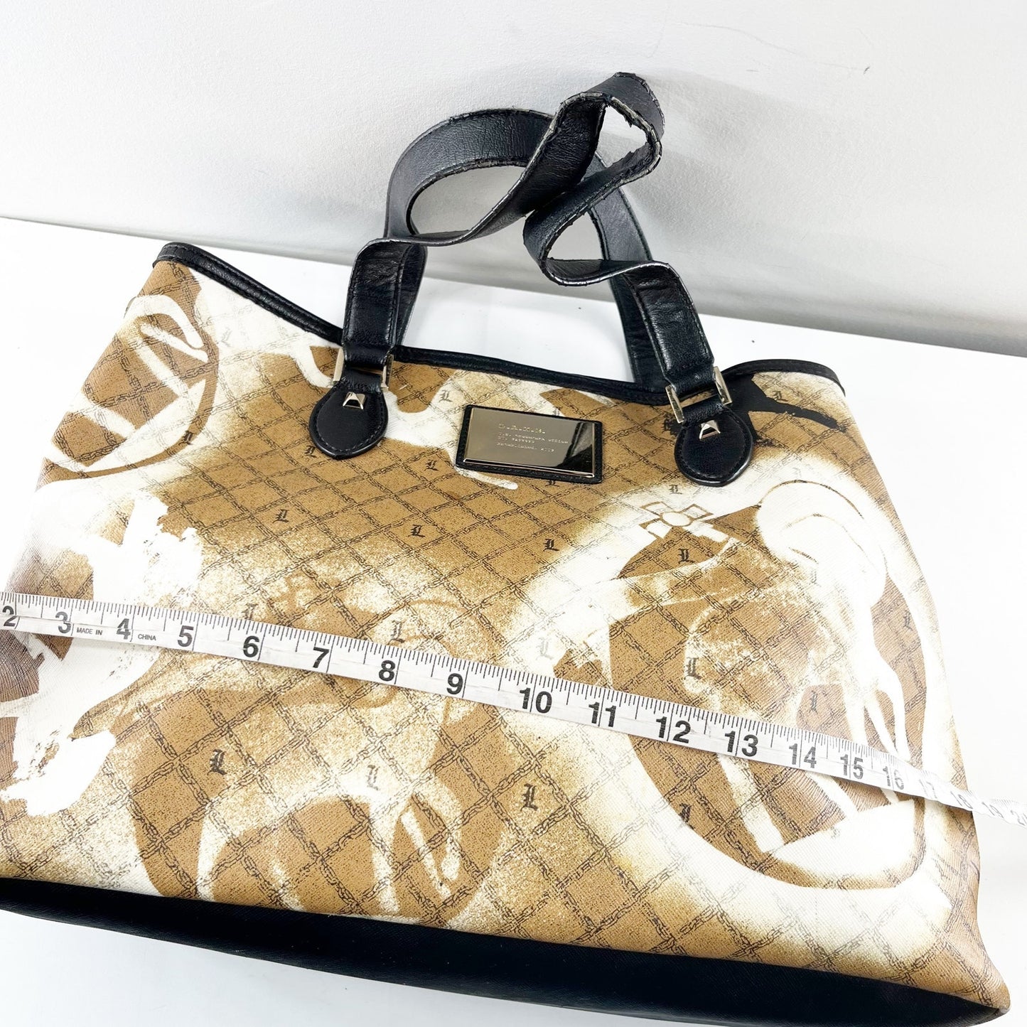 L.A.M.B by Gwen Stefani Stencil Pattern Tote Bag Purse Gold Black