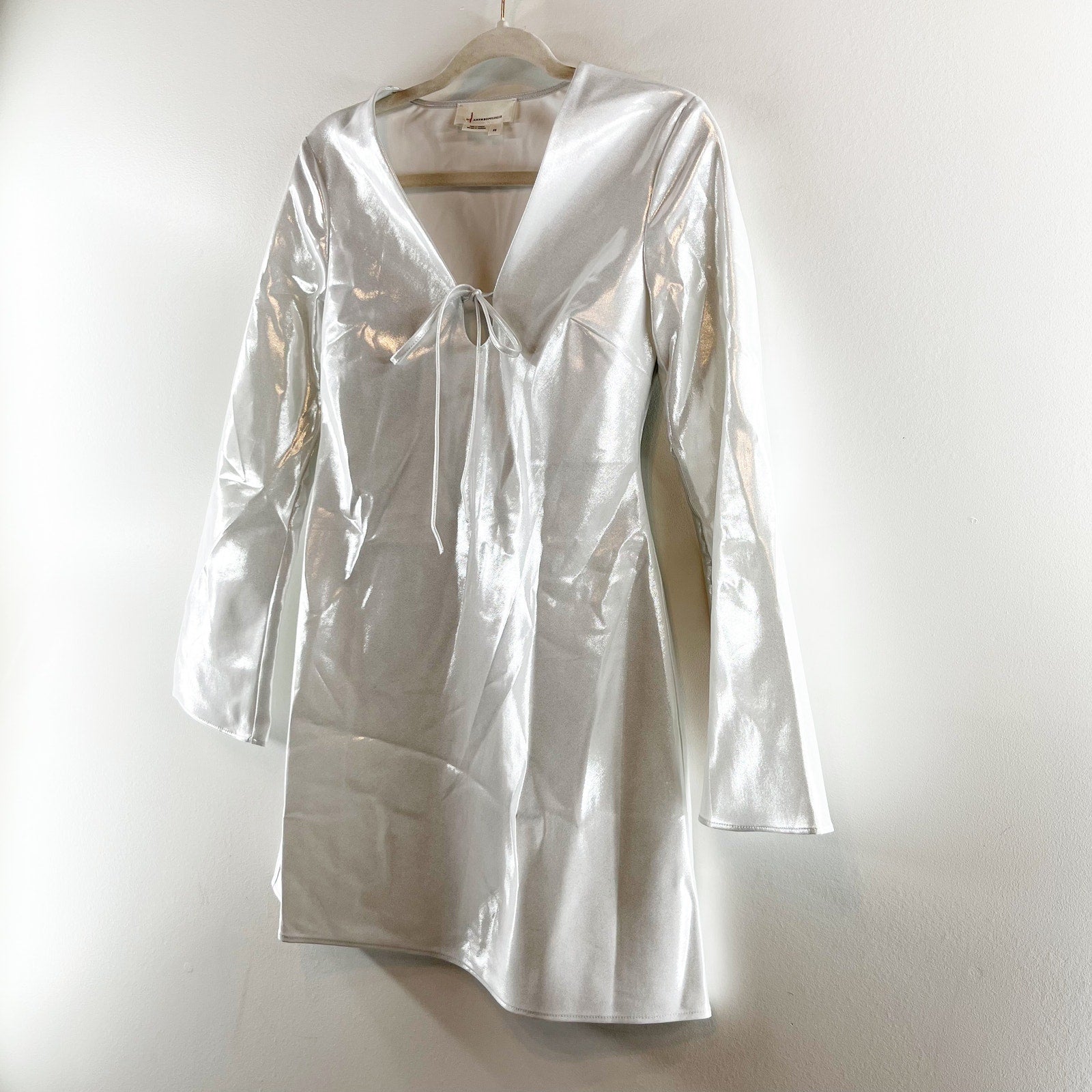Anthropologie Long-Sleeve V-Neck Metallic Mini Dress White XS Baystate Boutique & Consignment Anthropologie Long-Sleeve V-Neck Metallic Mini Dress White XS Baystate Boutique & Consignment