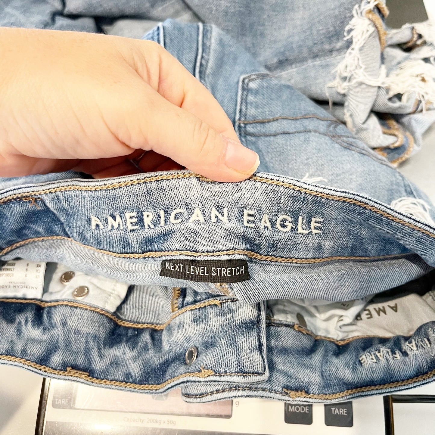 American Eagle Mid Rise Festival Flare Raw Hem Jeans Blue 0