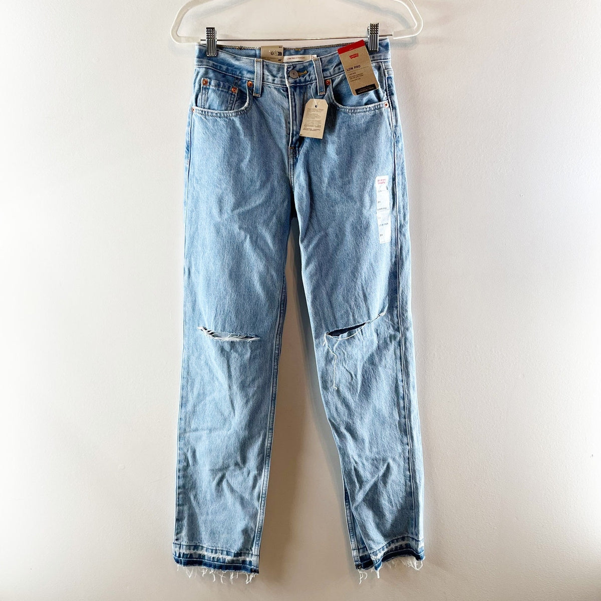 Levi's Low Pro Straight Leg Ripped Knees Released Raw Hem Jeans Blue 24